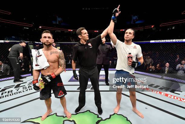 Brian Ortega celebrates after his knockout victory over Frankie Edgar in their featherweight bout during the UFC 222 event inside T-Mobile Arena on...