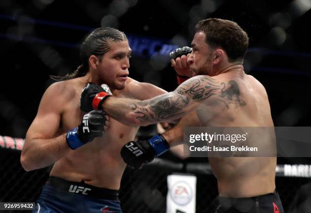 Frankie Edgar and Brian Ortega fight during their featherweight bout during UFC 222 at T-Mobile Arena on March 3, 2018 in Las Vegas, Nevada. Ortega...