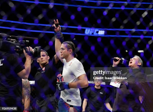 Brian Ortega celebrates his victory over Frankie Edgar following their featherweight bout during UFC 222 at T-Mobile Arena on March 3, 2018 in Las...