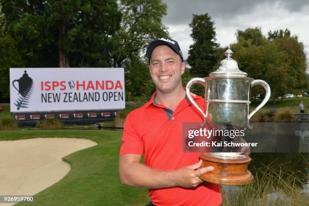 Daniel Nisbet of Australia poses with the Brodie Breeze Challenge Cup during day four of the ISPS Handa New Zealand Golf Open at Millbrook Golf...