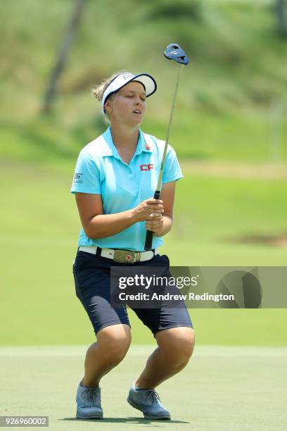 Brooke Henderson of Canada reacts to a missed putt on the 15th green during the final round of the HSBC Women's World Championship at Sentosa Golf...