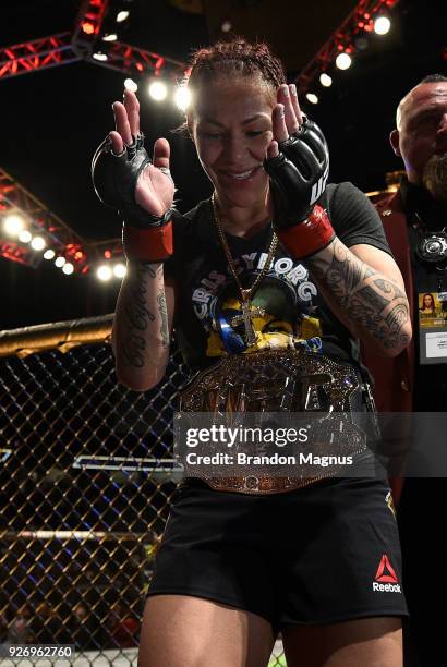 Cris Cyborg of Brazil celebrates after her TKO victory over Yana Kunitskaya of Russia in their women's featherweight bout during the UFC 222 event...