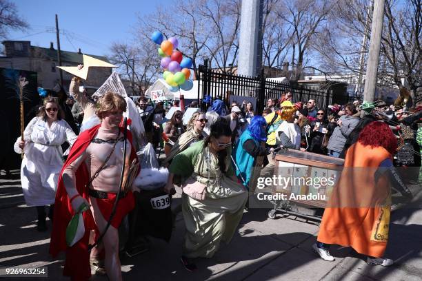 People participate in the "CHIditarod" shopping cart race in Chicago, Illinois, United States on March 03, 2018. People design and create their own...