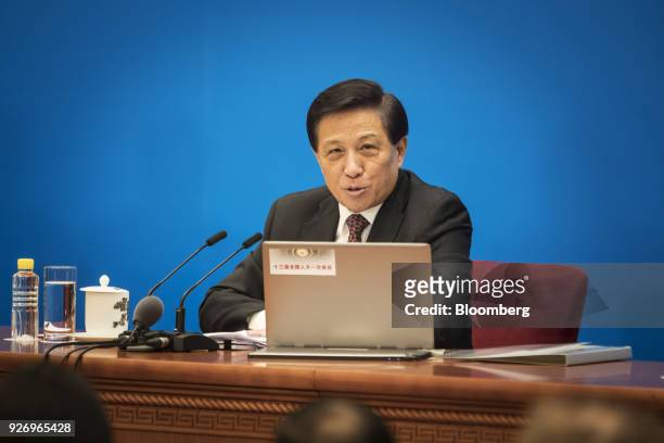 Zhang Yesui, China's vice foreign minister and spokesman for the National People's Congress , speaks during a news conference ahead of the first...