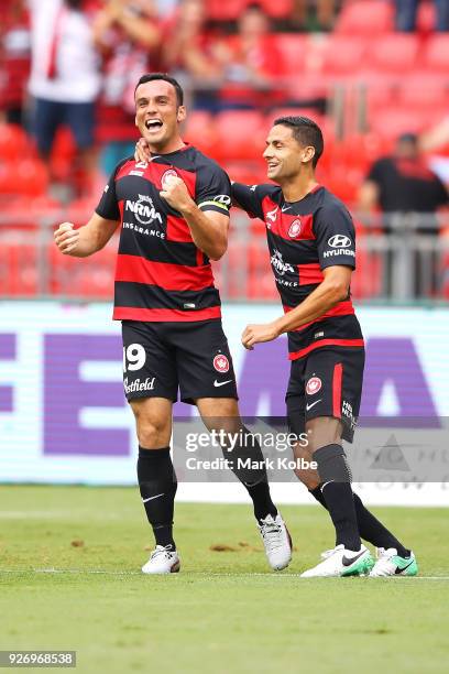 Mark Bridge and Marcelo Carrusca of the Wanderers celebrate Bridge scoring a goal during the round 23 A-League match between the Western Sydney...