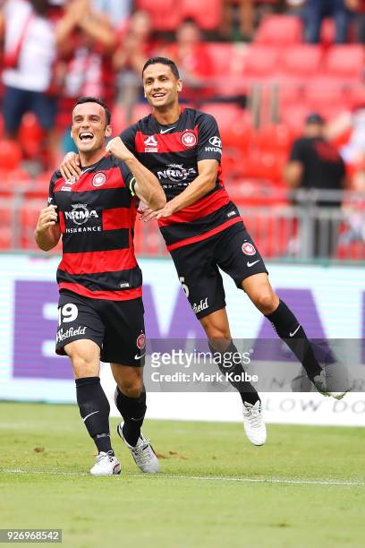 Mark Bridge and Marcelo Carrusca of the Wanderers celebrate Bridge scoring a goal during the round 23 A-League match between the Western Sydney...