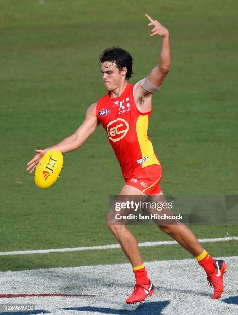 Jack Bowes of the Suns kicks the ball during the AFL JLT Community Series match between the Geelong Cats and the Gold Coast Suns at Riverway Stadium...