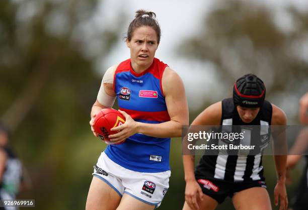 Emma Kearney of the Bulldogs runs with the ball during the round five AFLW match between the Collingwood Magpies and the Western Bulldogs at Ted...