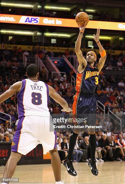 Brandan Wright of the Golden State Warriors puts up a shot during the NBA game against the Phoenix Suns at US Airways Center on October 30, 2009 in...