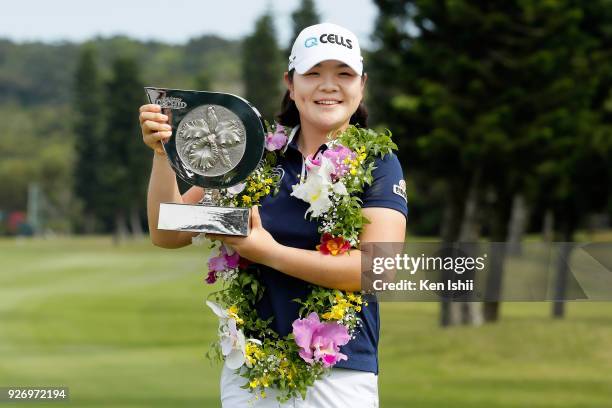 Min-Young Lee of Korea celebrates her win on the 18th green during the final round of the Daikin Orchid Ladies at Ryukyu Golf Club on March 4, 2018...