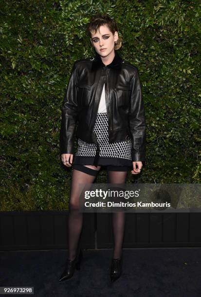 Ambassador Kristen Stewart, wearing CHANEL, attends Charles Finch and Chanel Pre-Oscar Awards Dinner at Madeo in Beverly Hills on March 3, 2018 in...