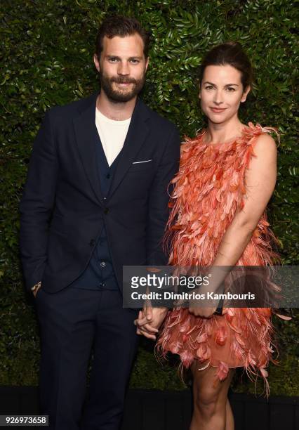 Jamie Dornan and Amelia Warner attend Charles Finch and Chanel Pre-Oscar Awards Dinner at Madeo in Beverly Hills on March 3, 2018 in Beverly Hills,...