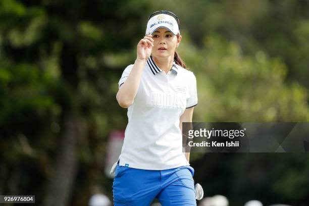 Shinobu Moromizato of Japan reacts aftre her putt on the 18th green during the final round of the Daikin Orchid Ladies at Ryukyu Golf Club on March...