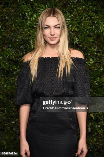 Jessica Hart, wearing CHANEL, attends Charles Finch and Chanel Pre-Oscar Awards Dinner at Madeo in Beverly Hills on March 3, 2018 in Beverly Hills,...