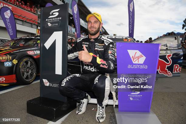 Shane Van Gisbergen driver of the Red Bull Holden Racing Team Holden Commodore ZB celebrates after winning race 2 for the Supercars Adelaide 500 on...