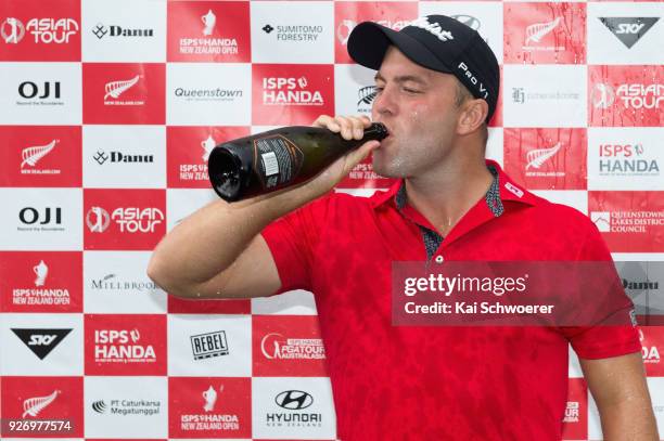 Daniel Nisbet of Australia drinks champagne after winning the Brodie Breeze Challenge Cup during day four of the ISPS Handa New Zealand Golf Open at...