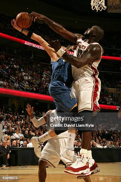 Shaquille O'Neal of the Cleveland Cavaliers blocks a shot attempt by Mike Miller of the Washington Wizards on November 3, 2009 at The Quicken Loans...