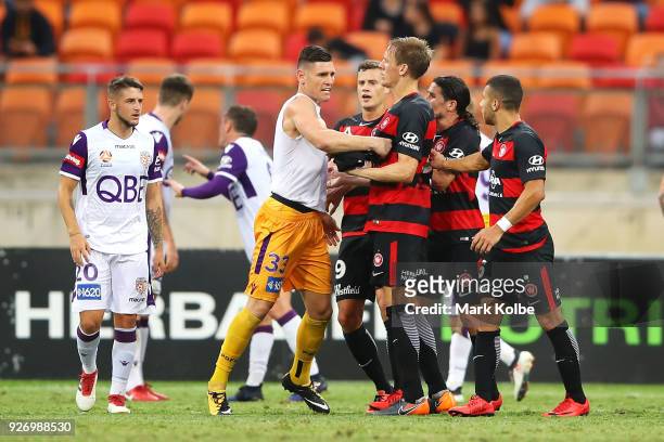 Liam Reddy of the Glory scuffles with Michael Thwaite of the Wanderers after Reddy was sent off during the round 23 A-League match between the...