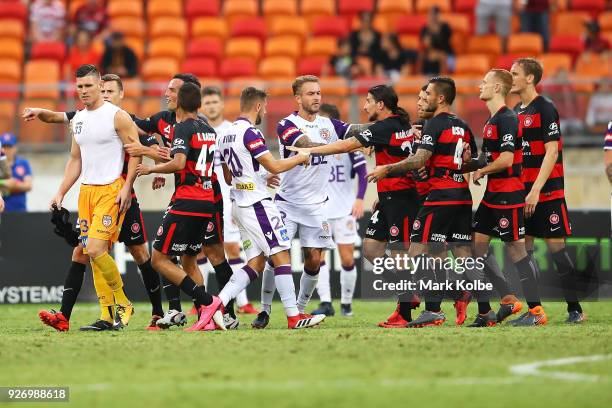 Liam Reddy of the Glory scuffles with the Wanderers players after Reddy was sent off during the round 23 A-League match between the Western Sydney...