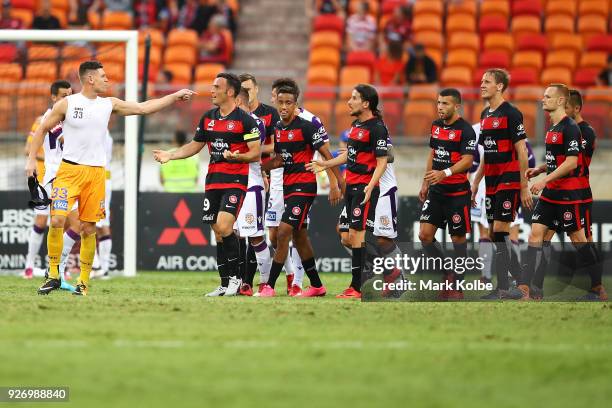 Liam Reddy of the Glory scuffles with the Wanderers players after Reddy was sent off during the round 23 A-League match between the Western Sydney...