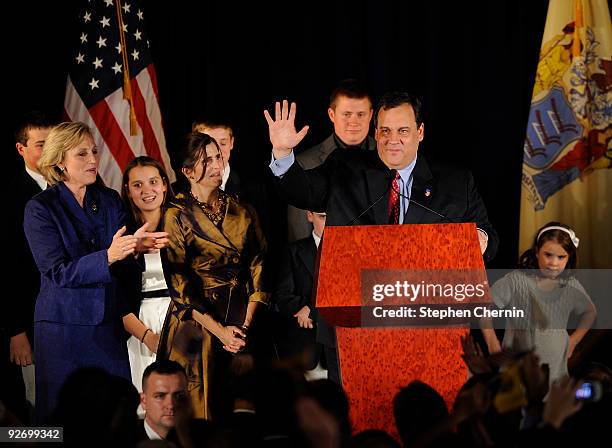 New Jersey Governor-elect Chris Christie waves to supporters as Lt. Governor-elect Kim Guadagno looks on November 3, 2009 in Parsippany New Jersey....
