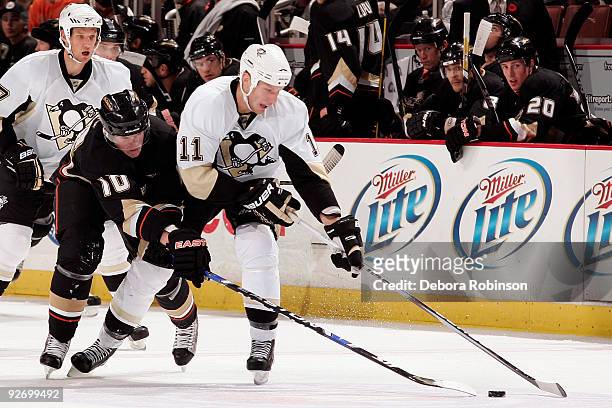 Jordan Staal of the Pittsburgh Penguins defends against Corey Perry of the Anaheim Ducks during the game on November 3, 2009 at Honda Center in...