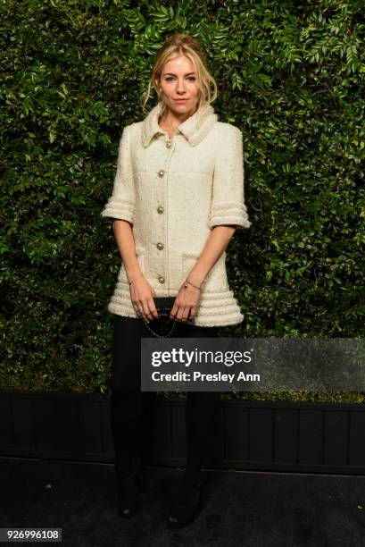 Sienna Miller attends Charles Finch And Chanel Pre-Oscar Awards Dinner At Madeo in Beverly Hills at Madeo Restaurant on March 3, 2018 in Los Angeles,...