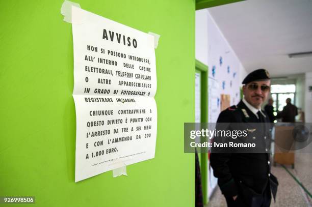 Italian citizens go to the polls to cast their votes to elect a new Italian government on March 4, 2018 in Pontecagnano Faiano, Italy. The economy...