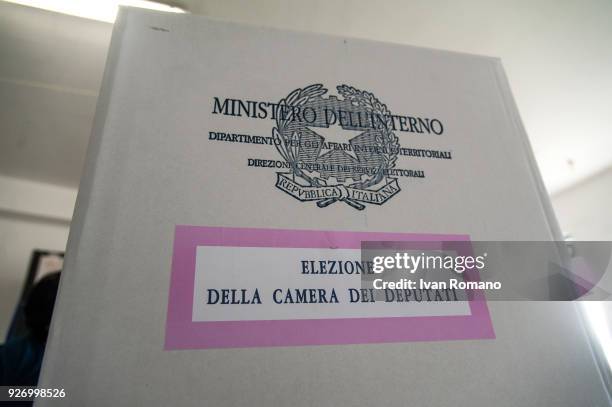 Italian citizens go to the polls to cast their votes to elect a new Italian government on March 4, 2018 in Pontecagnano Faiano, Italy. The economy...