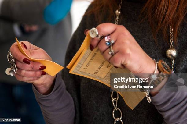 Italian citizens go to the polls to cast their votes to elect a new Italian government on March 4, 2018 in Pontecagnano Faiano, Italy. Approximately...