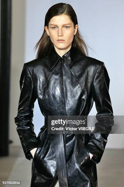 Model walks the runway during the Olivier Theyskens Ready to Wear fashion show as part of the Paris Fashion Week Womenswear Fall/Winter 2018/2019 on...