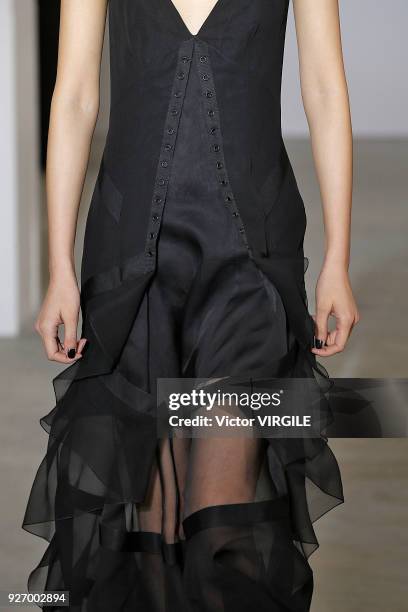 Model walks the runway during the Olivier Theyskens Ready to Wear fashion show as part of the Paris Fashion Week Womenswear Fall/Winter 2018/2019 on...