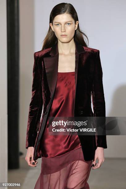 Model walks the runway during the Olivier Theyskens Ready to Wear fashion show as part of the Paris Fashion Week Womenswear Fall/Winter 2018/2019 on...