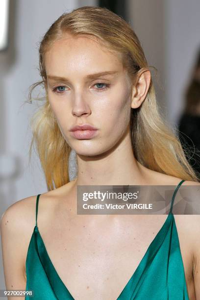 Model walks the runway during the Olivier Theyskens Ready to Wear fashion show as part of the Paris Fashion Week Womenswear Fall/Winter 2018/2019 on...