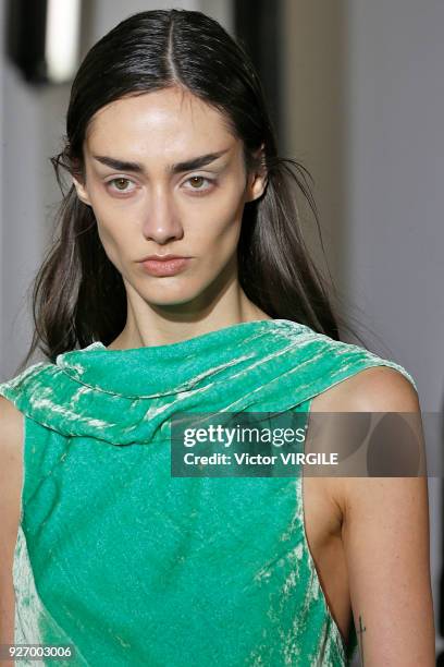 Model walks the runway during the Olivier Theyskens Ready to Wear fashion show as part of the Paris Fashion Week Womenswear Fall/Winter 2018/2019 on...