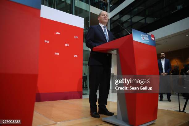 Olaf Scholz, Acting Chairman of the German Social Democrats , speaks to journalists following the SPD member vote over the party's coalition contract...