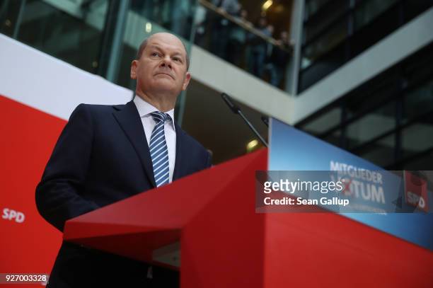 Olaf Scholz, Acting Chairman of the German Social Democrats , speaks to journalists following the SPD member vote over the party's coalition contract...