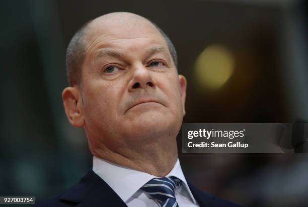 Olaf Scholz, Acting Chairman of the German Social Democrats , speaks to journalists following the SPD member vote over the party's coalition contract...