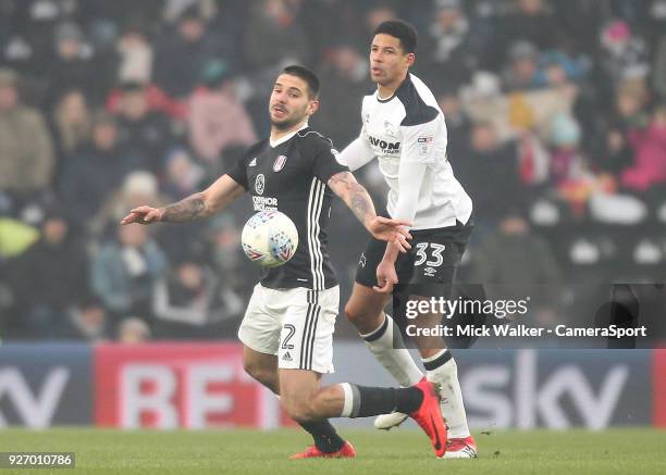 Derby County's Curtis Davies in action with Fulham's Aleksandar Mitrovic during the Sky Bet Championship match between Derby County and Fulham at...