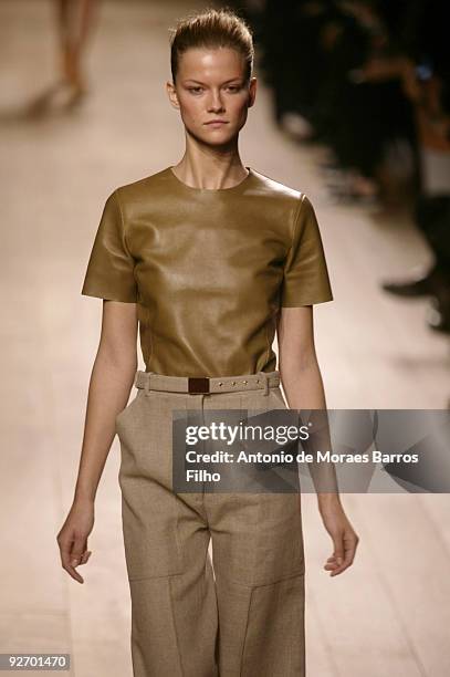 Model walks the runway during the Celine Pret a Porter show as part of the Paris Womenswear Fashion Week Spring/Summer 2010 on October 5, 2009 in...