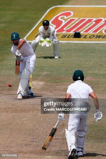 South Africa batsman Theunis de Bruyn hits the ball during the fourth day of the first Test cricket match between South Africa and Australia at The...