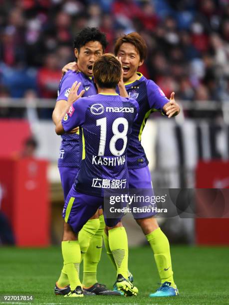 Kosei Shibasaki of Sanfrecce Hiroshima celebrates scoring his side's first goal during the J.League J1 match between Urawa Red Diamonds and Sanfrecce...