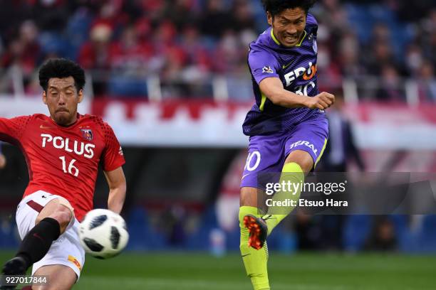 Kosei Shibasaki of Sanfrecce Hiroshima scores his side's first goal during the J.League J1 match between Urawa Red Diamonds and Sanfrecce Hiroshima...