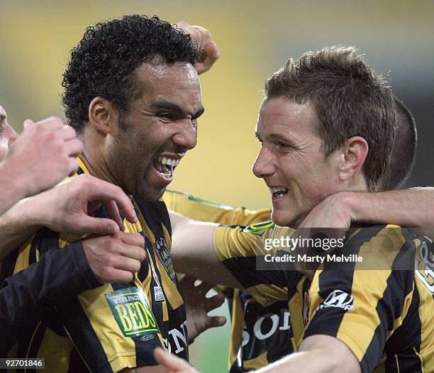 Chris Greenacre and Paul Ifill of the Phoenix celebrate a goal during the round 10 A-League match between the Wellington Phoenix and the Newcastle...