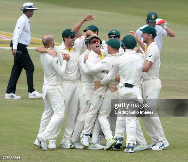 Australia celebrate the run out of AB de Villiers of the Proteas during day 4 of the 1st Sunfoil Test match between South Africa and Australia at...