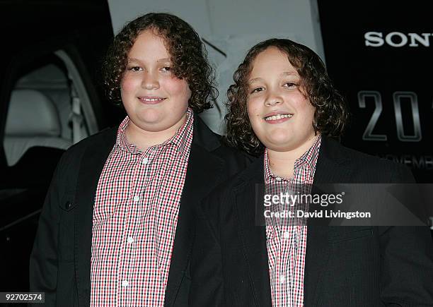 Actors and identical twins Philippe Haussmann and Alexandre Haussmann attend the premiere of Sony Pictures' "2012" at Regal Cinemas LA LIVE on...