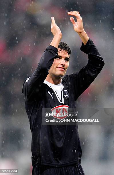 Bordeaux' French midfielder Yoann Gourcuff celebrates with supporters after the Bayern Munich vs Girondins de Bordeaux Champions League Group A...