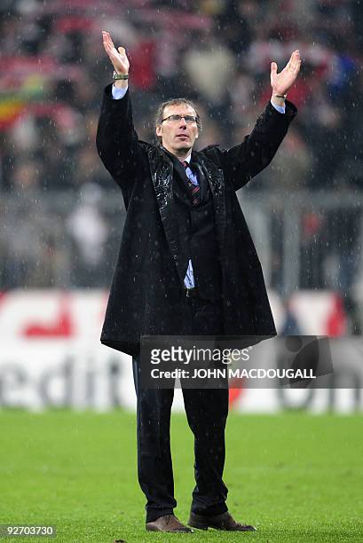 Bordeaux' coach Laurent Blanc celebrates with supporters after the Bayern Munich vs Girondins de Bordeaux Champions League Group A football match in...