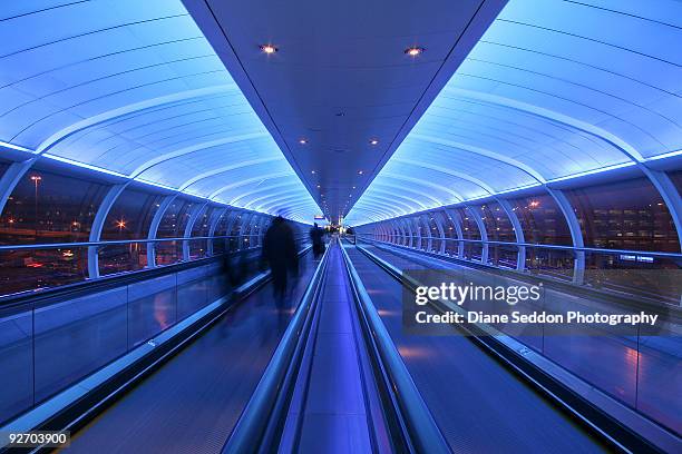 manchester airport rail link corridor - moving walkway airport stock pictures, royalty-free photos & images