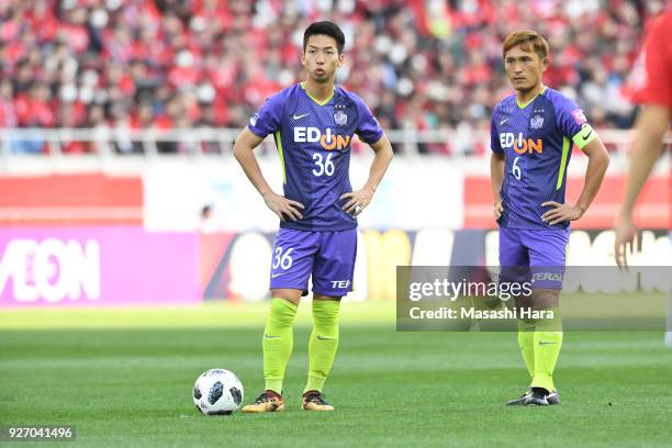 Hayao Kawabe and Toshihiro Aoyama of Sanfrecce Hiroshima look on during the J.League J1 match between Urawa Red Diamonds and Sanfrecce Hiroshima at...